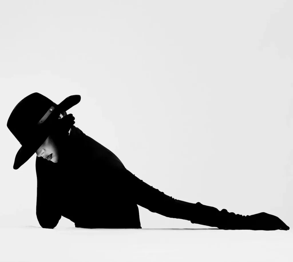silhouette of a person wearing cowboy hat
